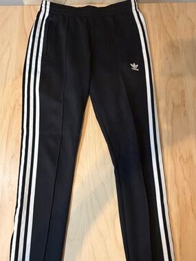 Adidas Womans Black Track Pants with White Three-Stripe Detailing